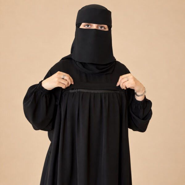 تفاصيل الواجهة الأمامية لعباية الطواف ندى